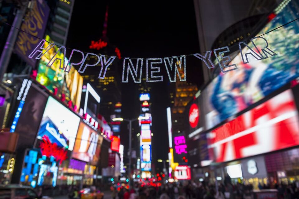 A “Happy New Year” banner hanging over Times Square in New York.