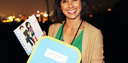 Actress holding little passports