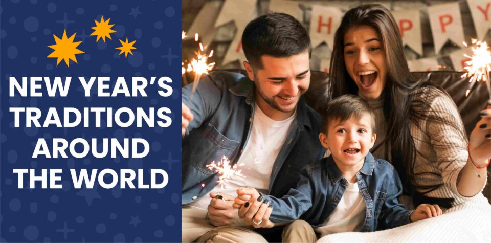 A family holds sparklers to celebrate the new year