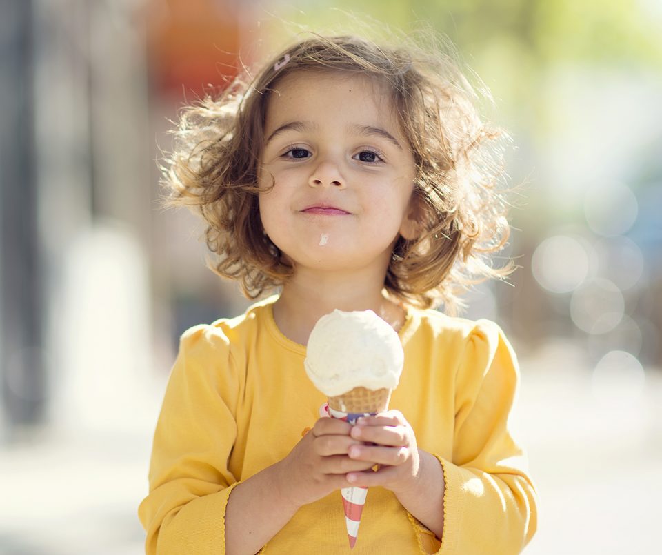Girl licking ice cream