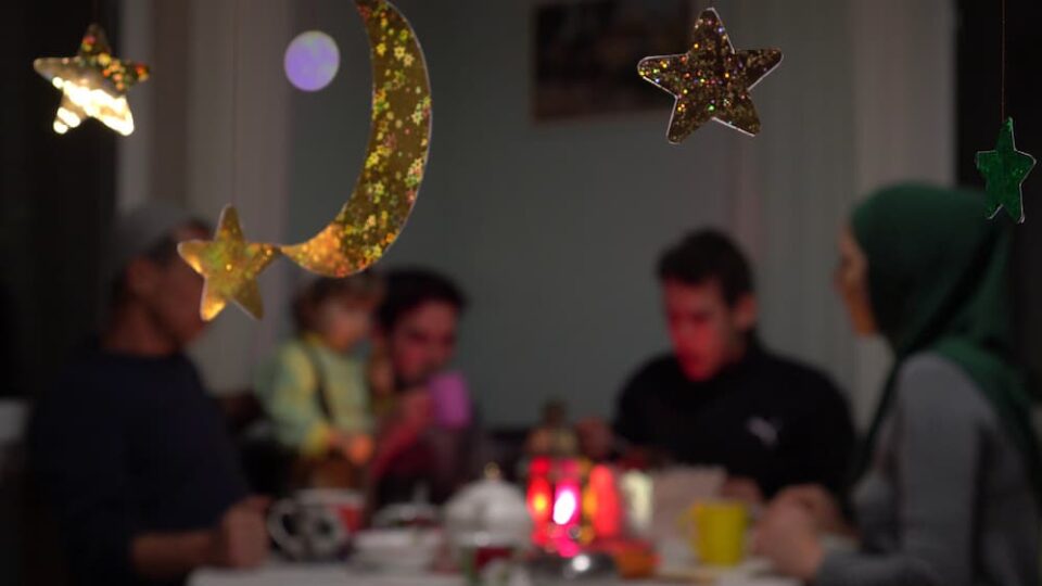 Family enjoying iftar evening meal during Ramadan