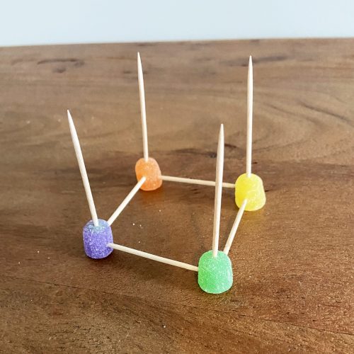 build a gumdrop pyramid step 2: 4 toothpicks sticking up from each gumdrop corner