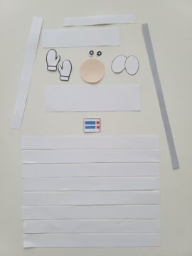 Cut-out paper pieces of astronaut craft