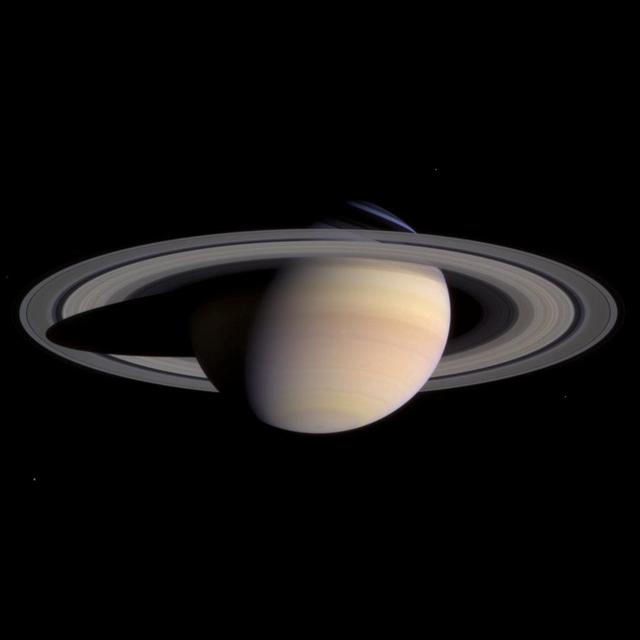 Saturn lit from below, showing its rings
