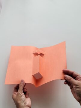 Cut and folded construction paper opened up