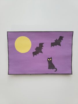 Construction paper decorated with Halloween images