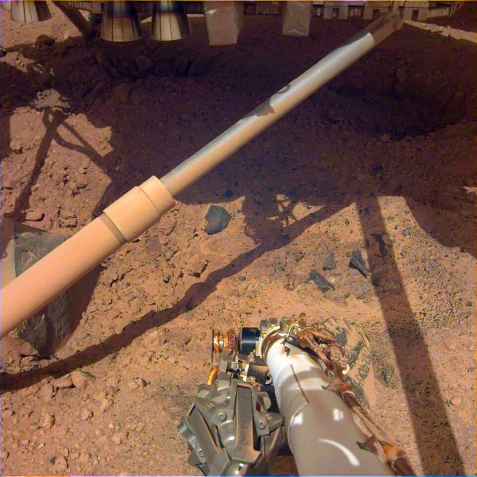 Two pits excavated by NASA's InSight lander thrusters