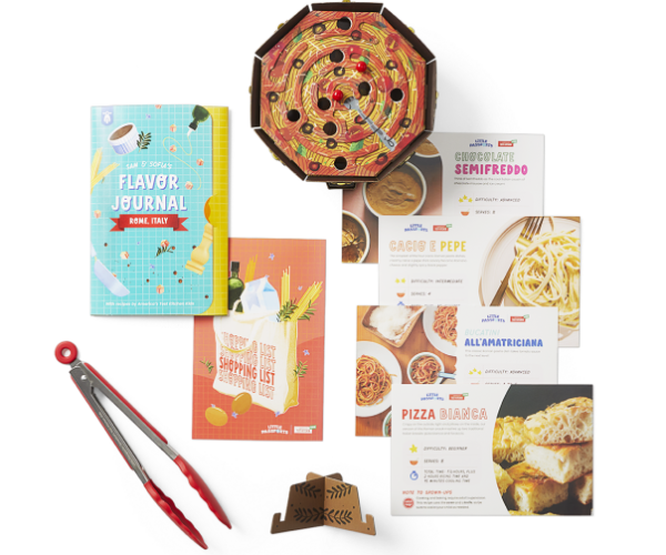 Tongs, game, and recipes from Little Passports’ Kitchen Adventures subscription box