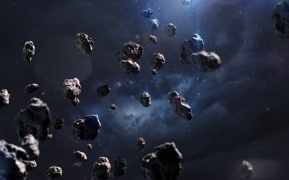 Asteroids floating through space.