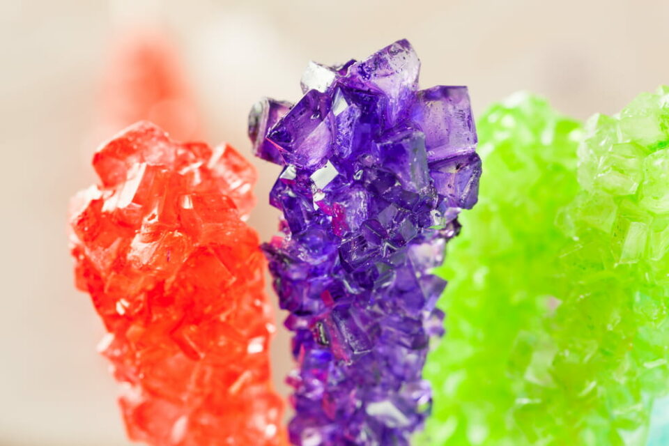 Closeup of three rock candy sticks