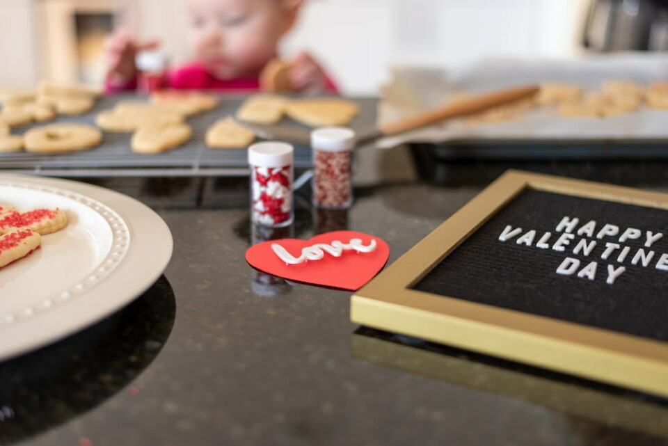 A-young-child-decorating-Valentines-Day-cookies