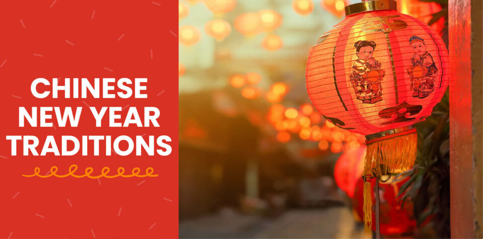 A street decorated with red paper lanterns for Chinese New Year.