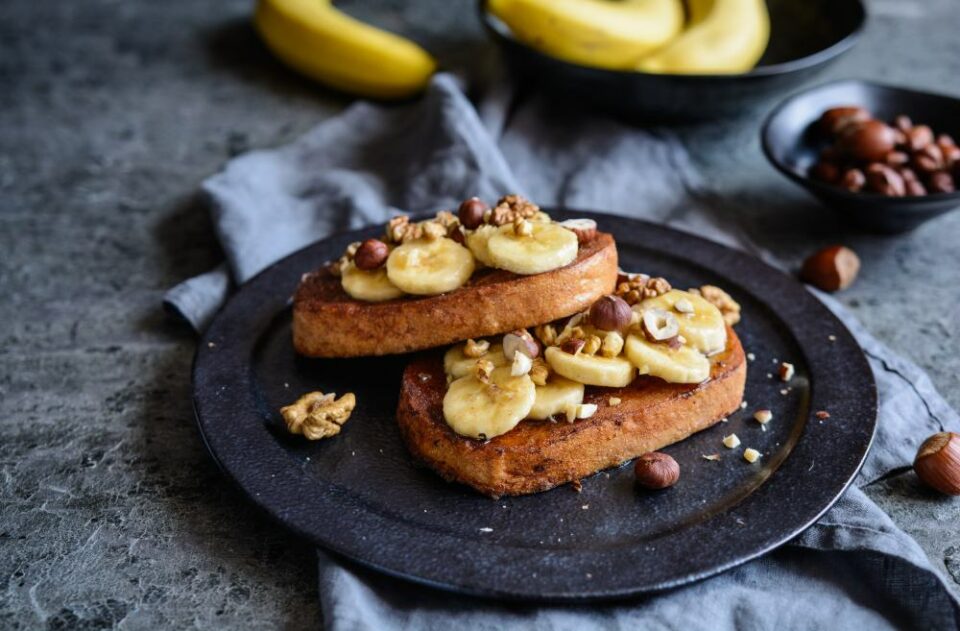 French-toast-topped-with-bananas-syrup-and-walnuts