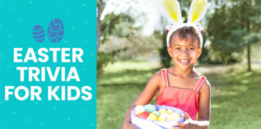A young girl wearing bunny ears and holding a basket of Easter eggs