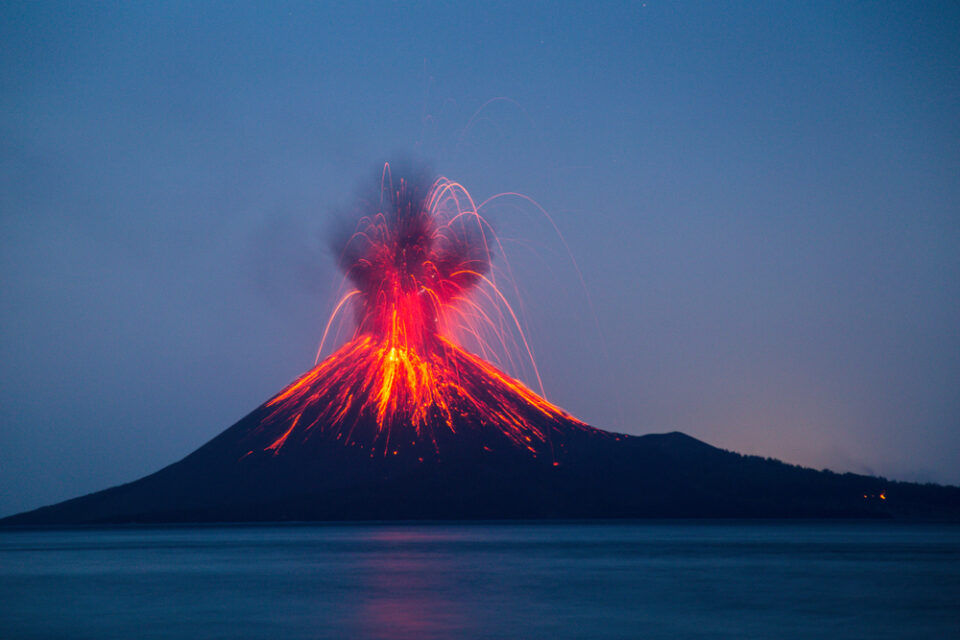 Krakatau volcano in Indonesia erupting at night.