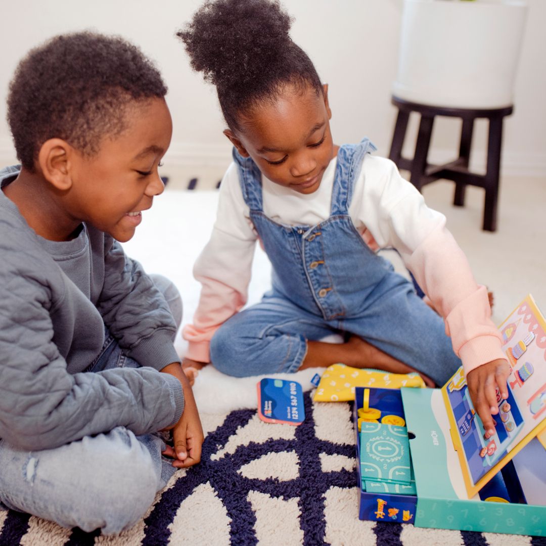 Kids playing with HOMER explore numbers kit