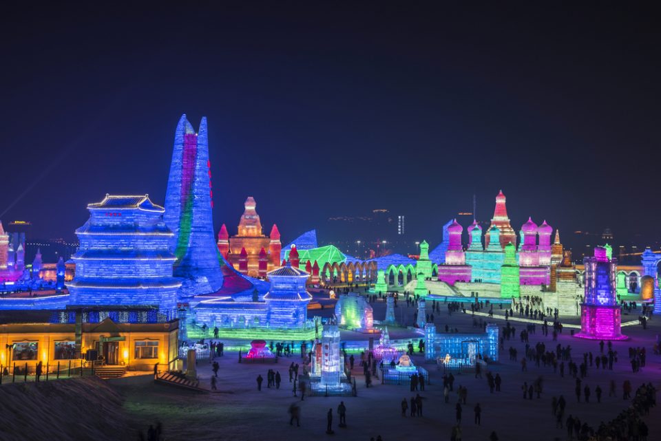Full lighted cityscape of ice sculpture at the Harbin International Ice and Snow Sculpture Festival