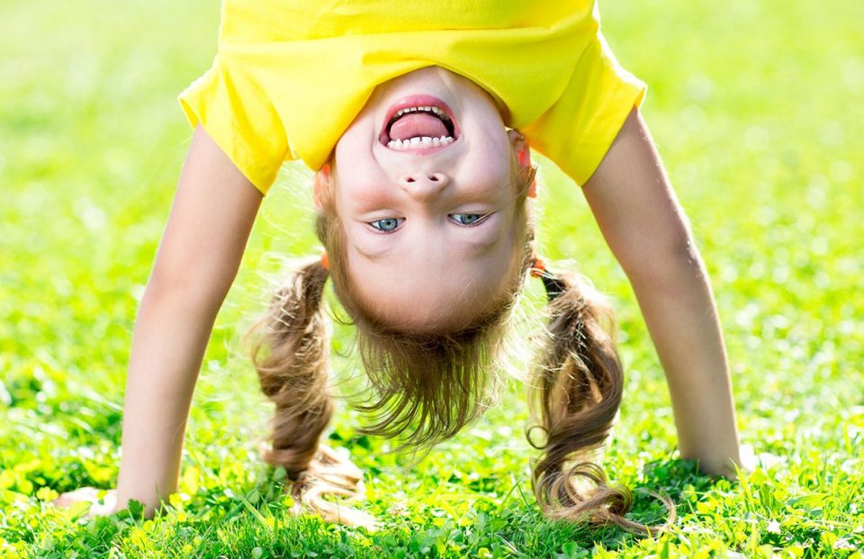 Young Girl Playing Outdoors