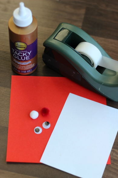 Supplies to make a Santa cone craft with Little Passports