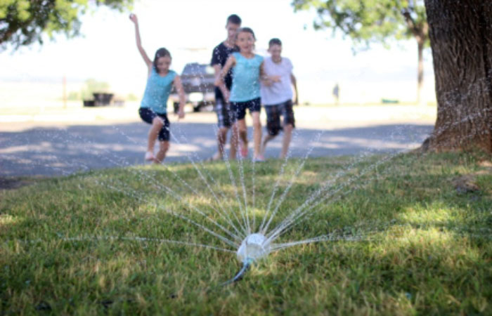 Soda bottle sprinkler