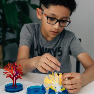 Child with Science Junior coral reef activity