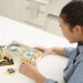 Child with Create + Play: Pinball kit