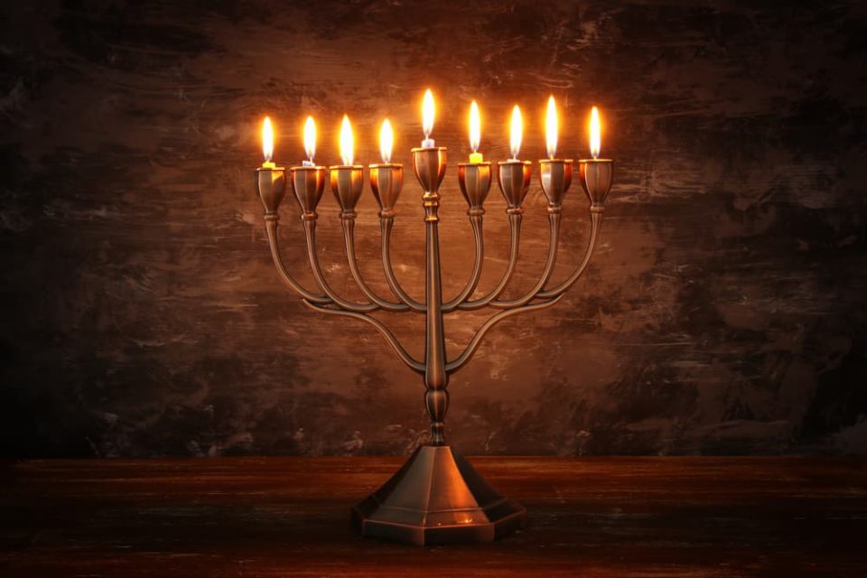 Hannukah menorah with lit candles
