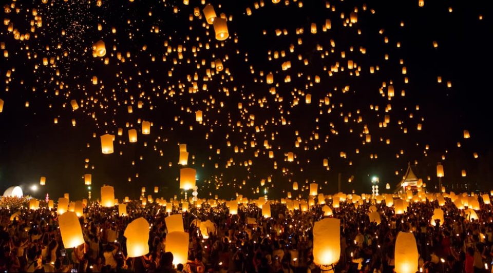 Sky lanterns floating into the air at the Pingxi Lantern Festival