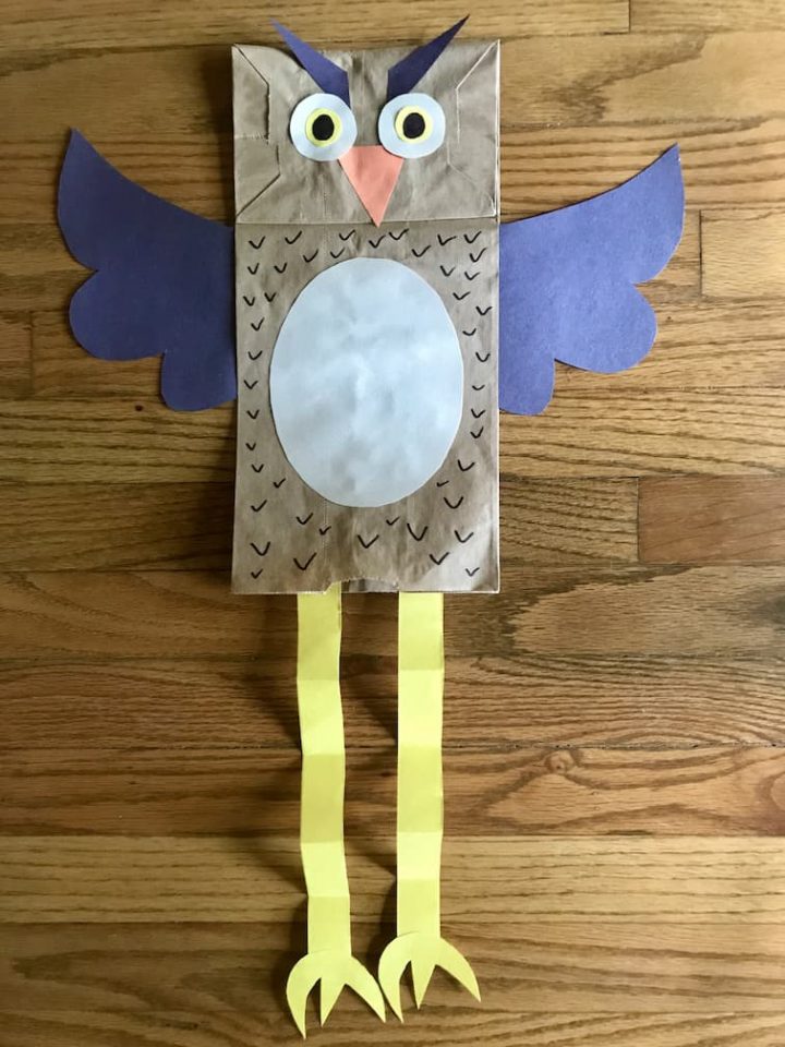 Paper bag owl puppet with legs down