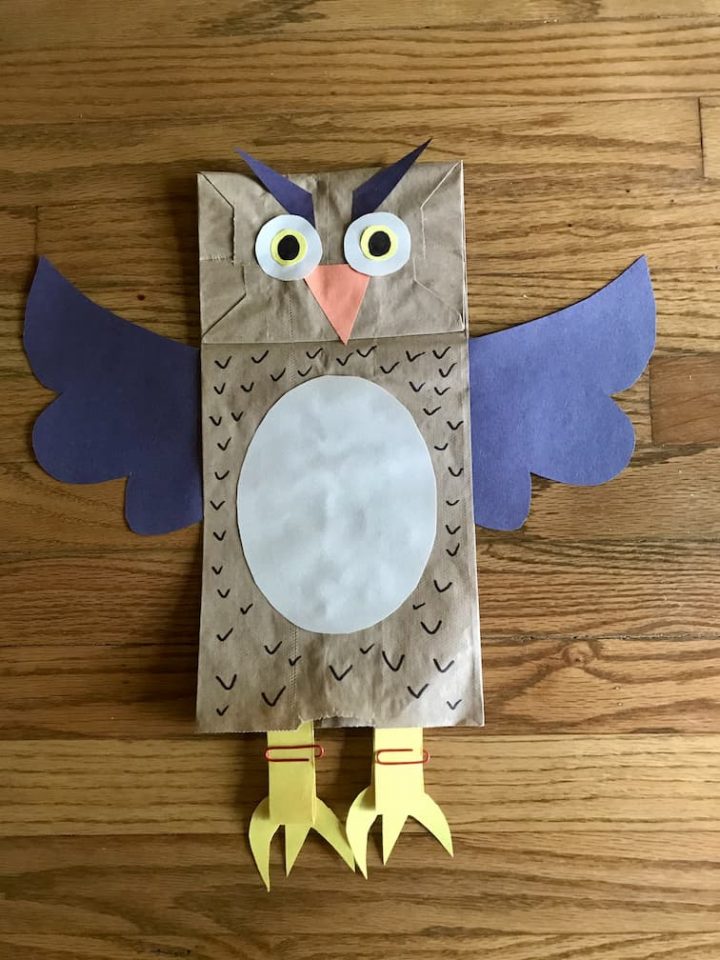 Paper bag owl puppet with legs up